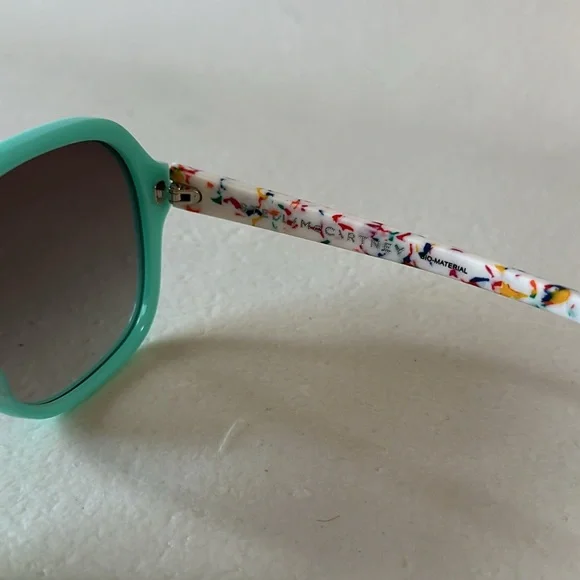 Stella McCartney teal sunglasses